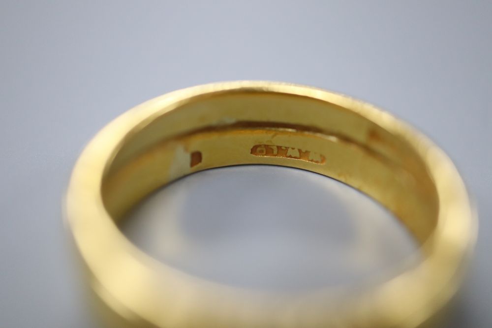 A 22ct gold double wedding band( two fused together), size N/O, 6.2 grams.